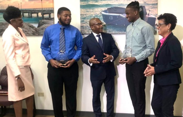 Jadun Clarke and Richard Carter receive Ministers Maritime Award